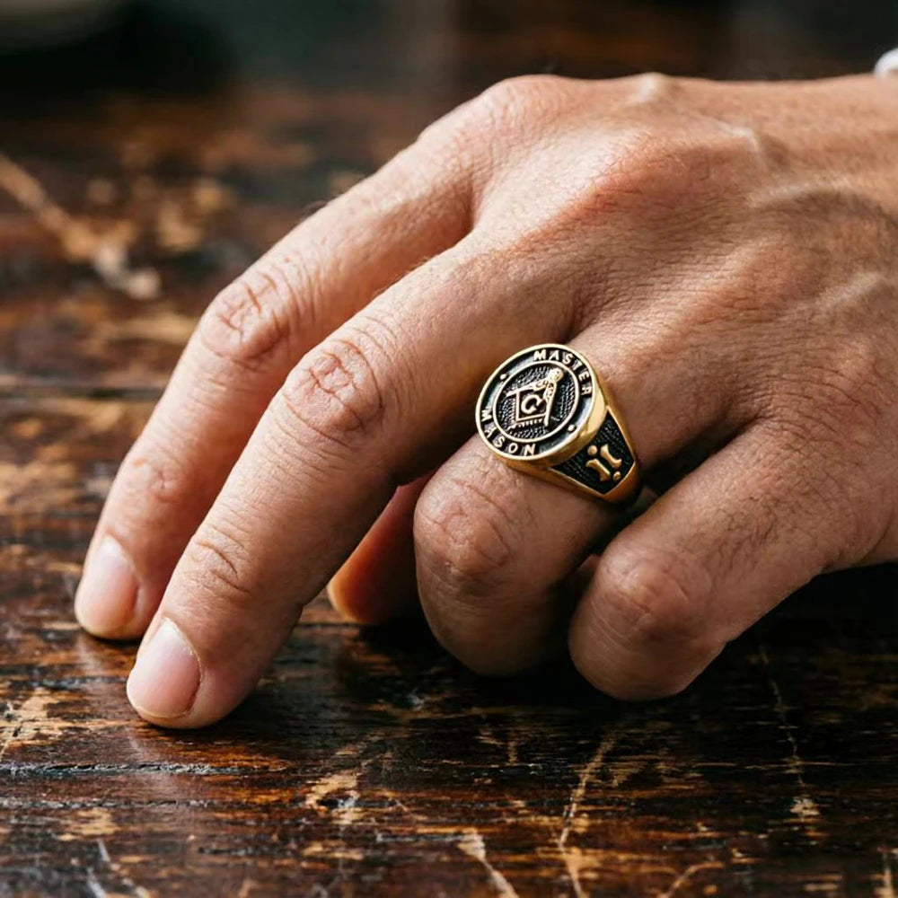 Angled hand view of black-face Master Mason ring
