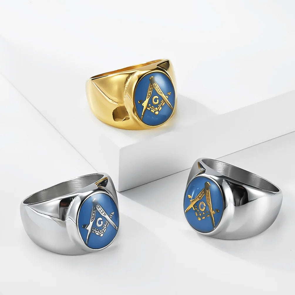 Three round blue Masonic rings in gold-tone and silver-tone finishes