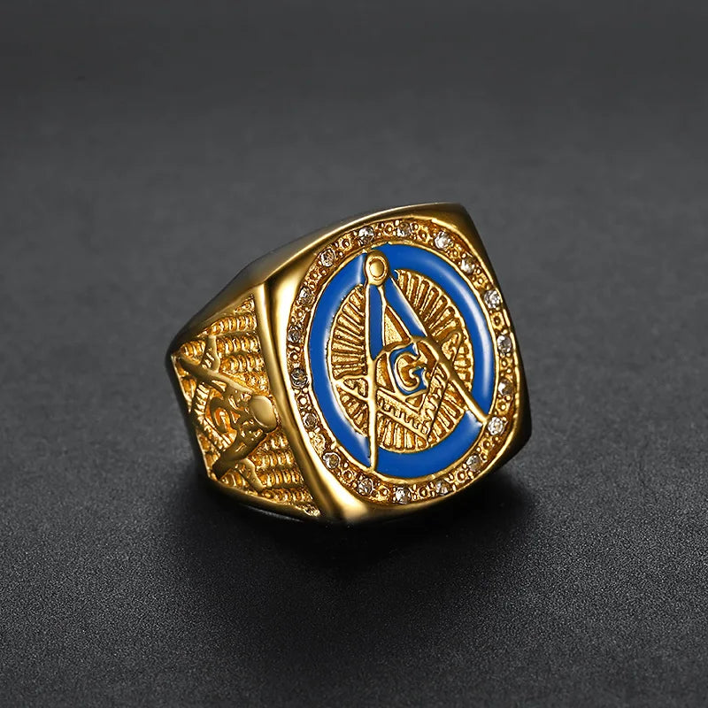 Gold-tone blue Masonic ring with clear stone border