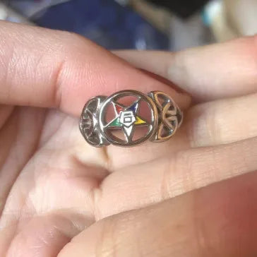 Antiqued Order of the Eastern Star oval signet held on a hand