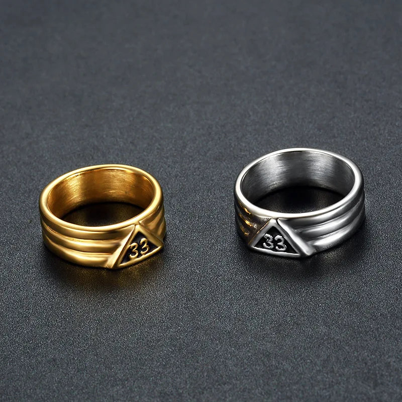 Two 33rd Degree Scottish Rite bands on dark surface