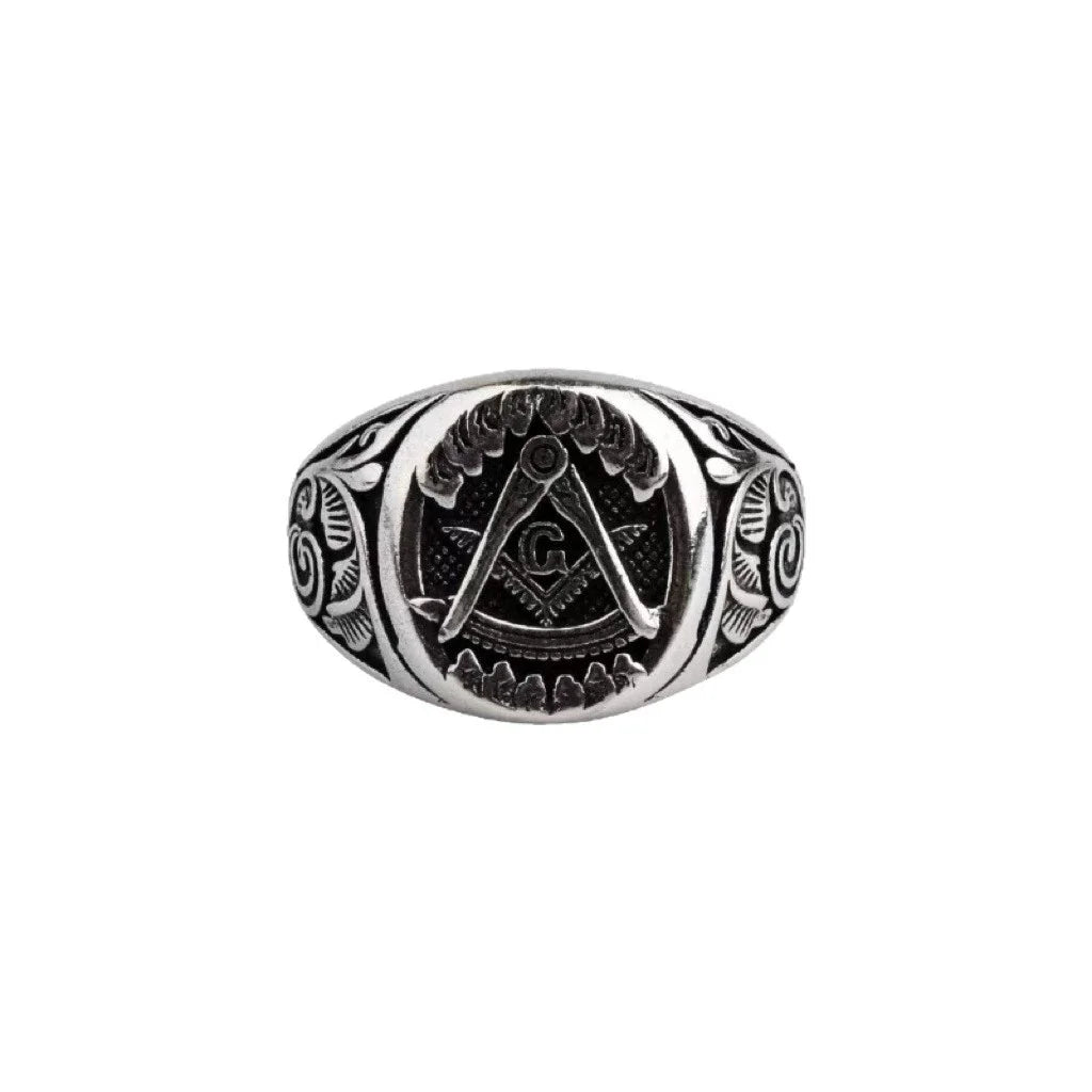 Antiqued silver-tone Masonic ring with oval face and scroll shoulders