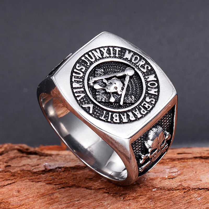 Angled Masonic skull signet showing dark shoulder panels