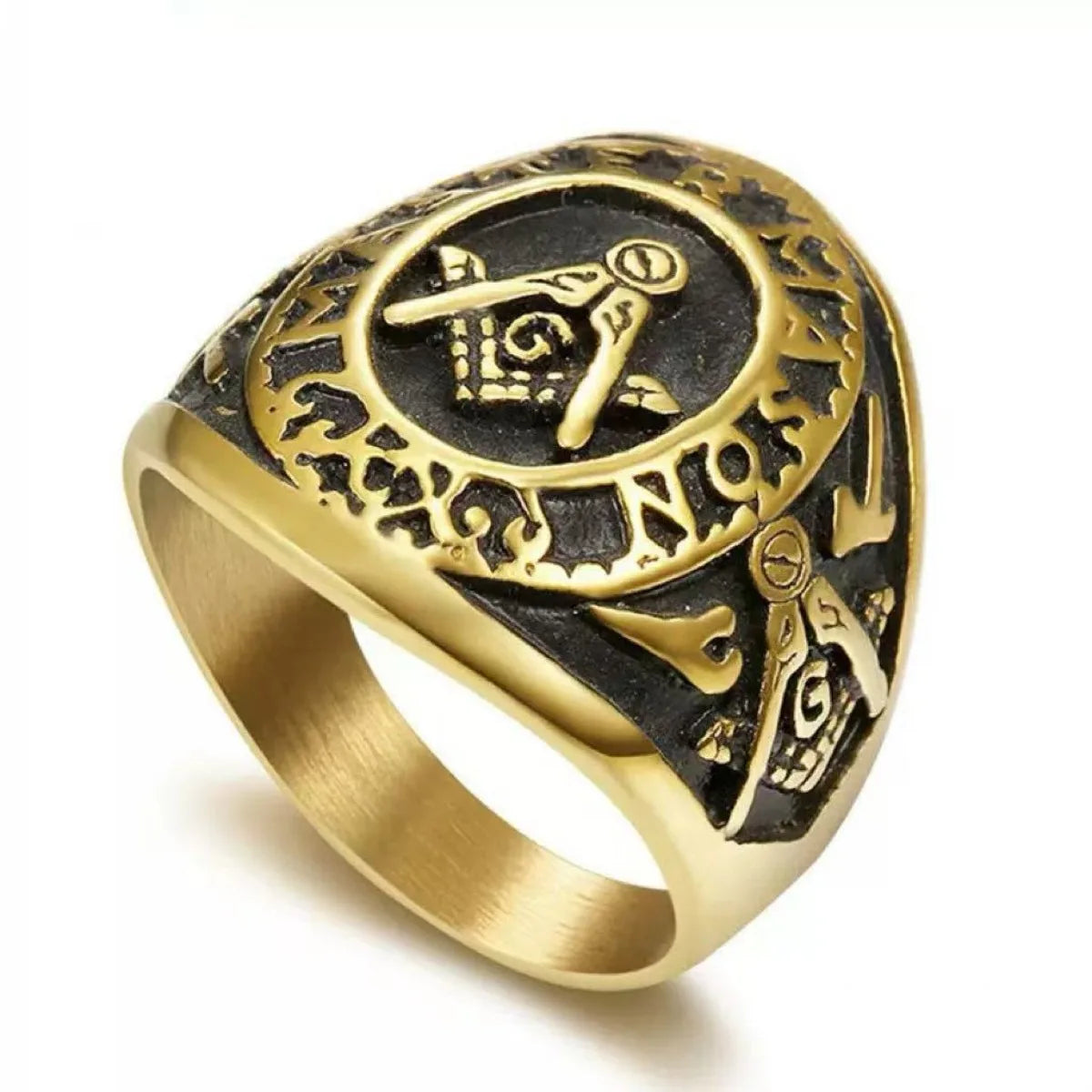 Gold-tone Masonic ring with ornate oval G emblem face and dark recesses