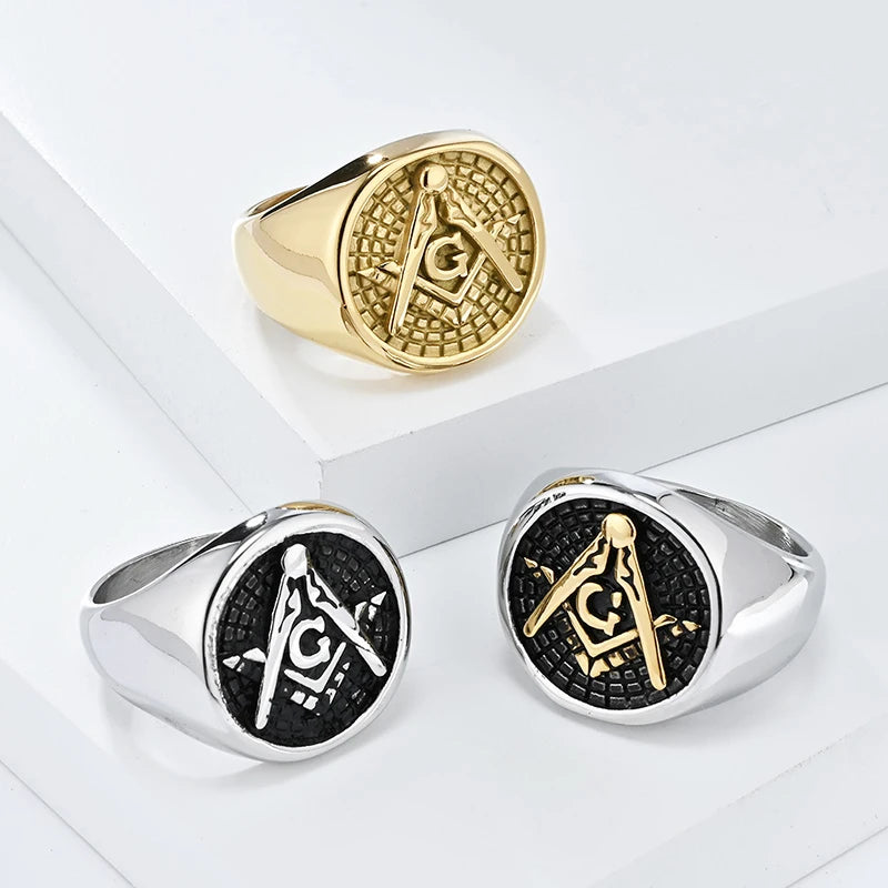 Three grid-face Masonic rings on white blocks