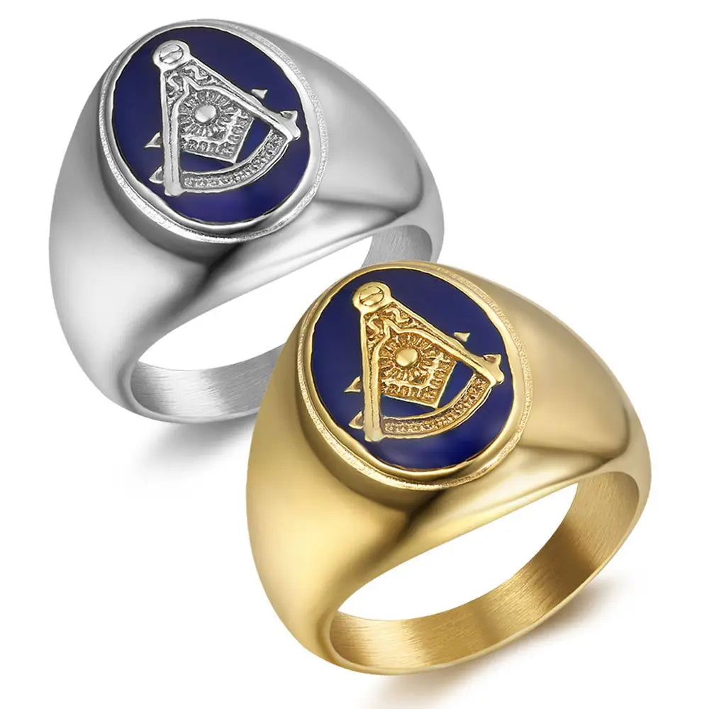 Gold-tone and silver-tone Past Master rings with blue oval faces