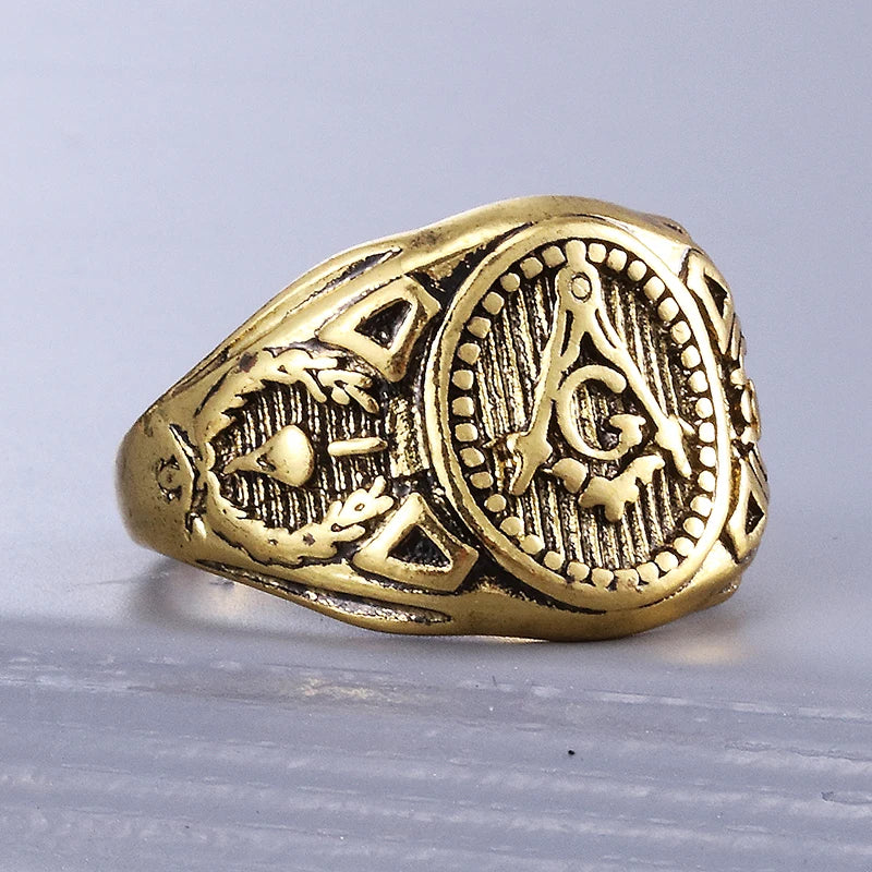 Opposite shoulder of antiqued oval Masonic ring