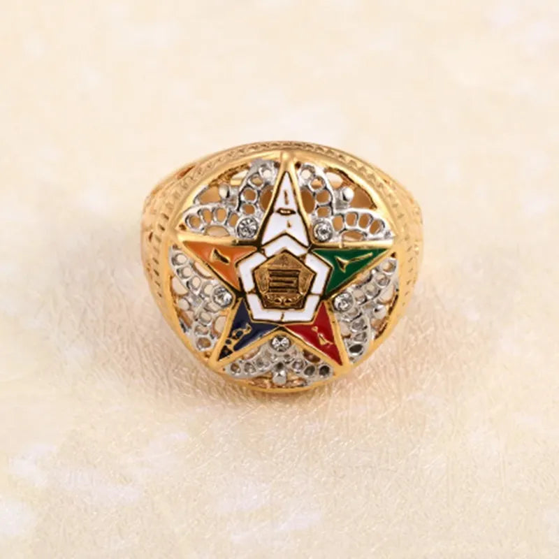 Gold-tone Eastern Star ring with multicolored emblem and stone-set cushion face