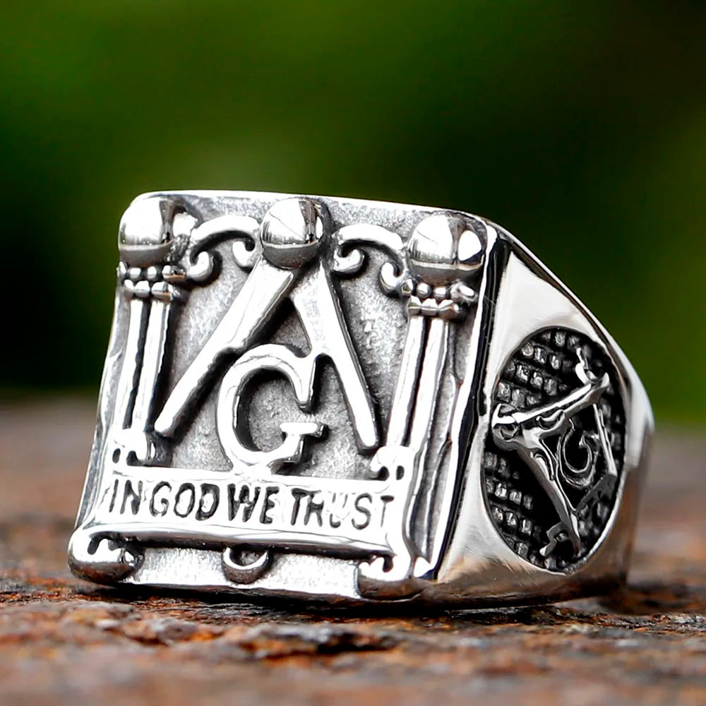 Close front view of In God We Trust Masonic signet