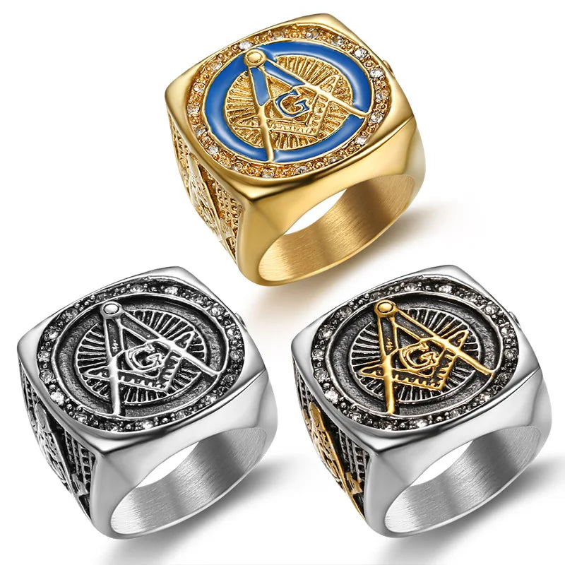 Three Masonic signets with sunburst faces and decorative stone borders