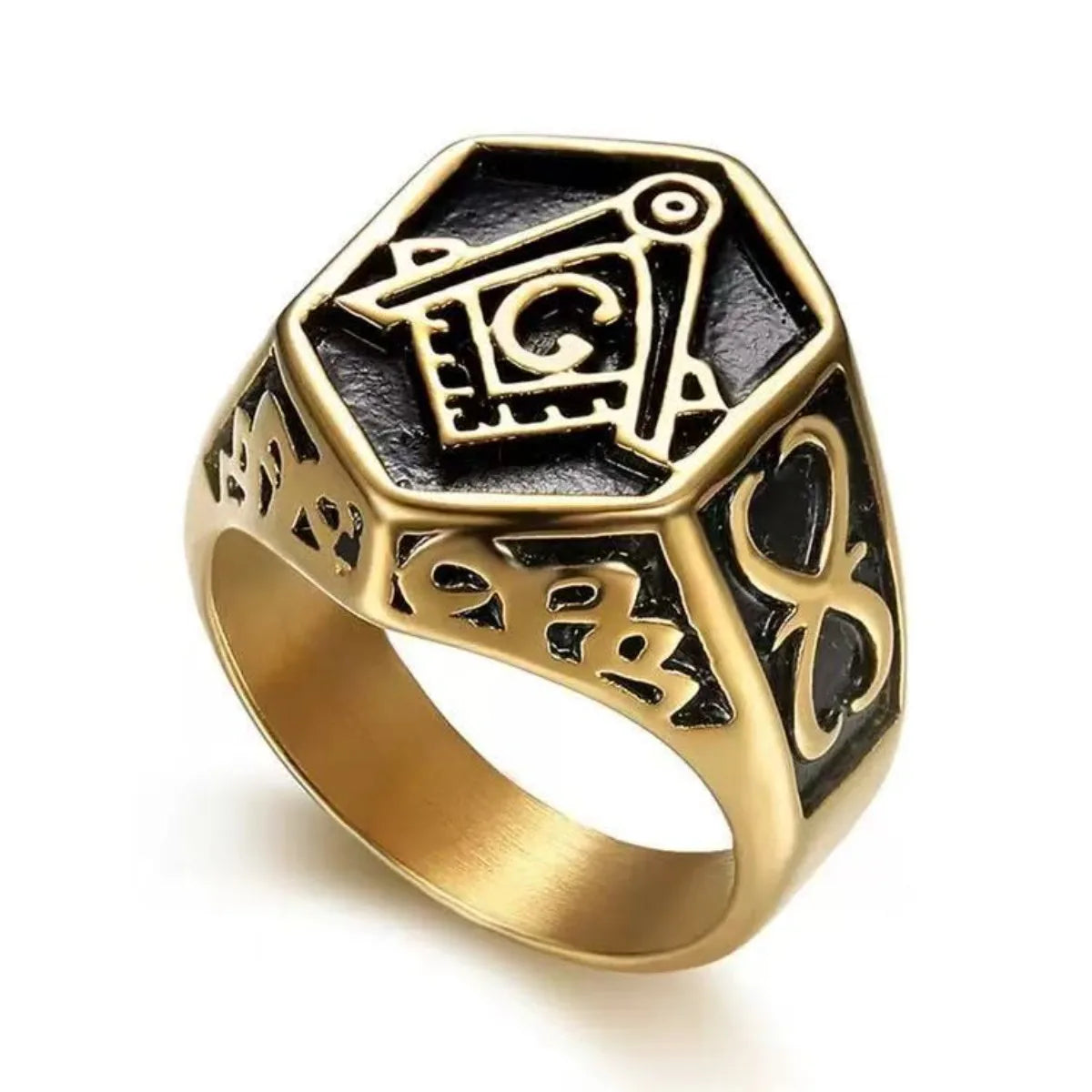 Gold-tone Masonic ring with hexagonal black face and decorative shoulders