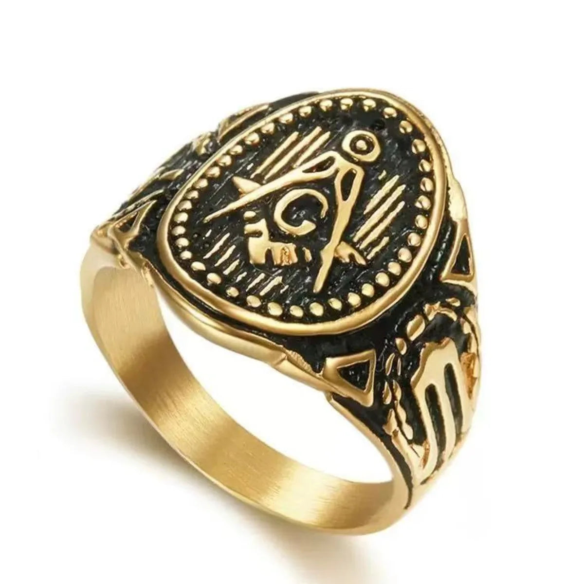 Gold-tone oval Masonic ring with sunray face and decorative raised border